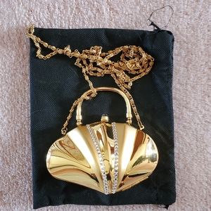Gold metal evening bag with rhinestones